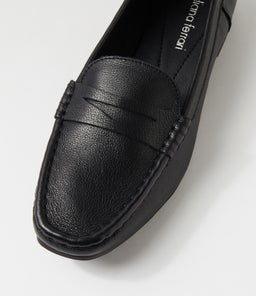 TATTERY DF BLACK LEATHER