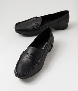 TATTERY DF BLACK LEATHER